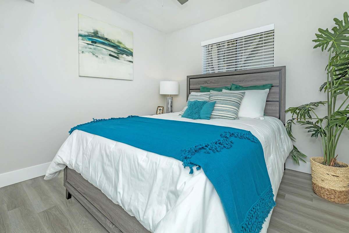Furnished bedroom shown — representative home at Solara.