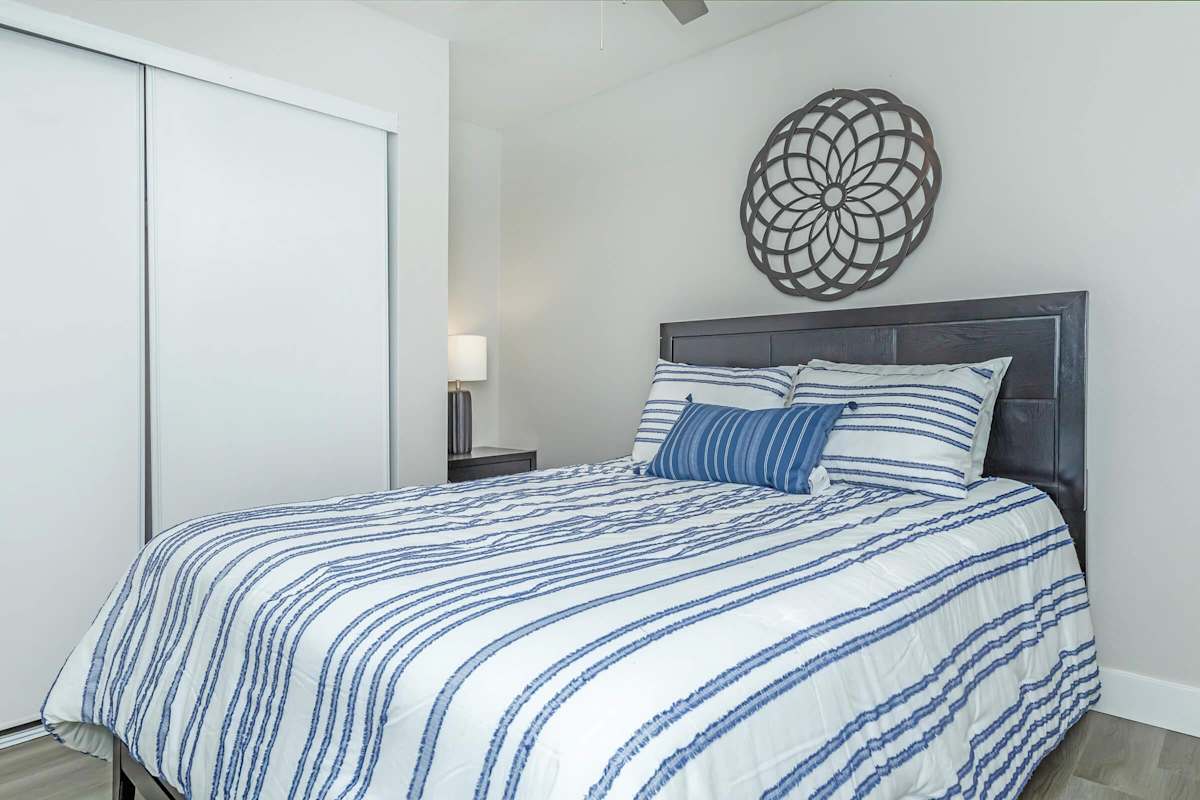 Furnished bedroom shown — representative home at Solara.