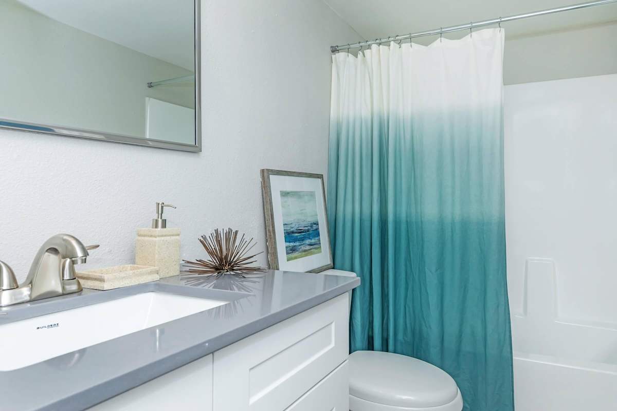 Apartment bathroom — representative home at Solara.