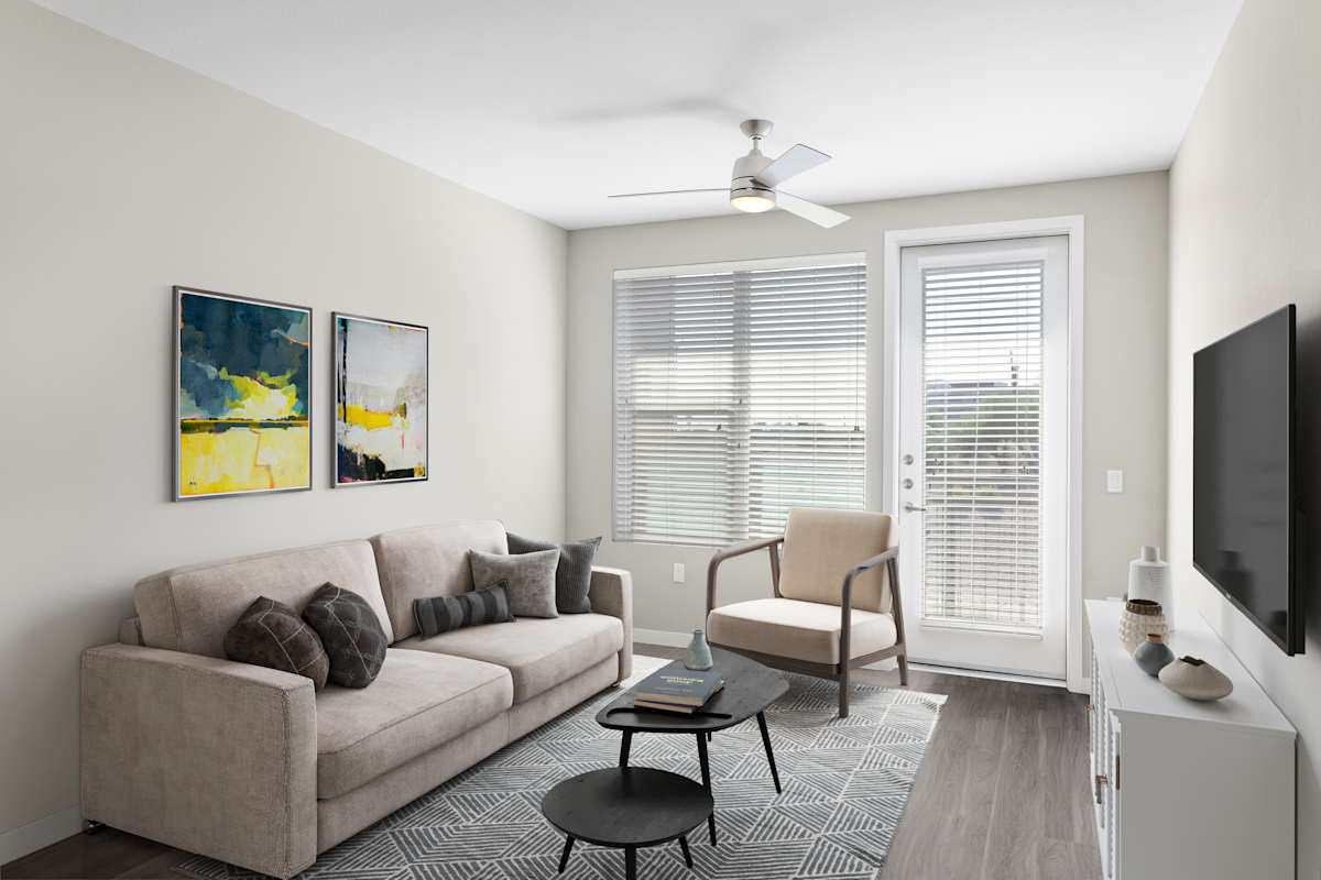 Furnished apartment living area shown at The Tessera.