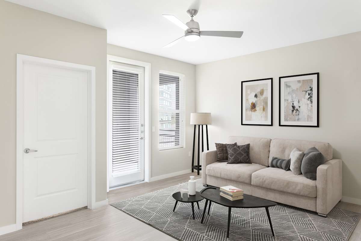 Furnished apartment living area shown at The Tessera.