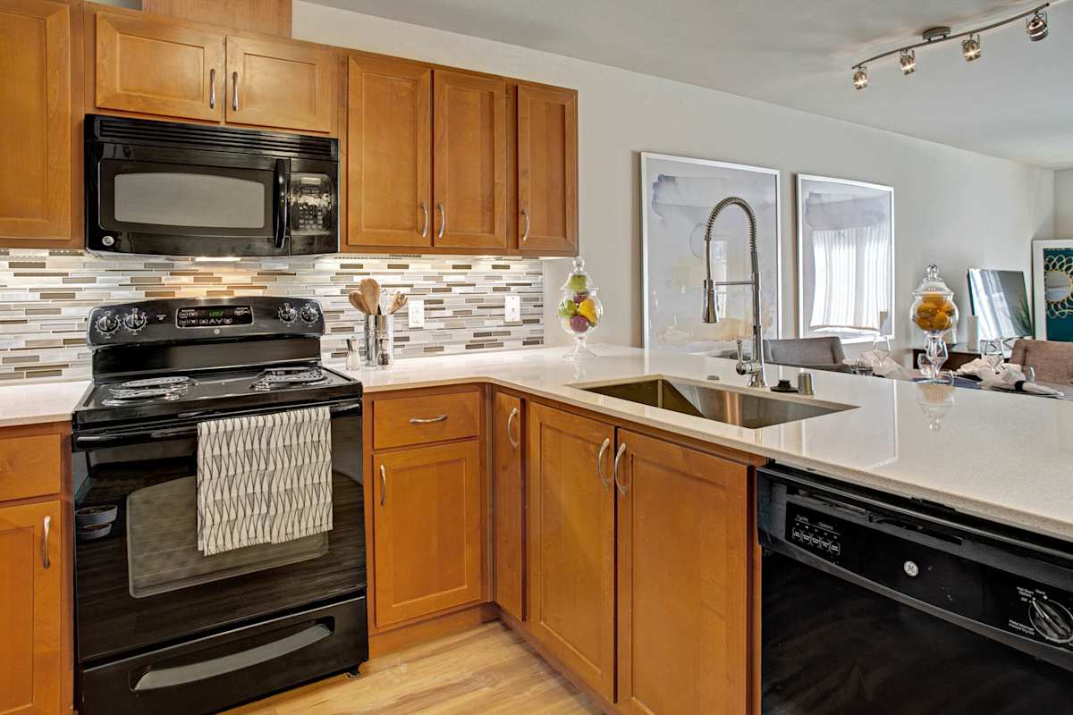 Echo Lake Apartments apartment kitchen with black appliances - Shoreline, WA