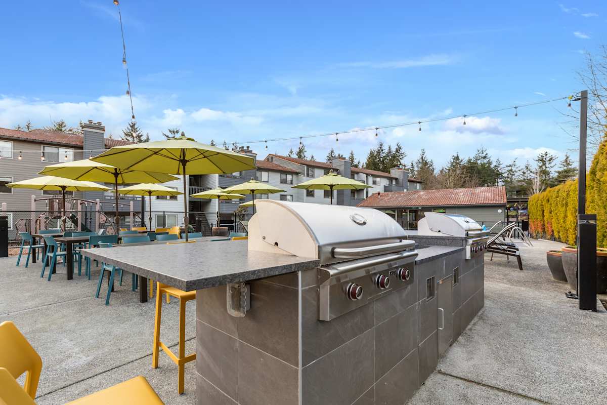 Taluswood Apartments outdoor patio seating area - Mountlake Terrace, WA