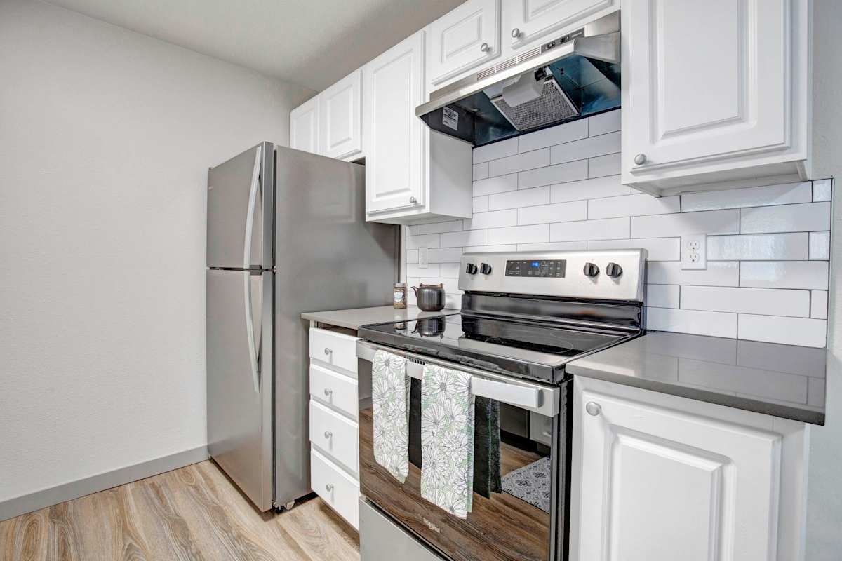 Taluswood Apartments furnished kitchen with stainless appliances - Mountlake Terrace, WA