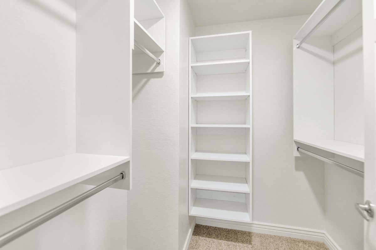 Walk-in closet — representative home at Townhomes at Biltmore.