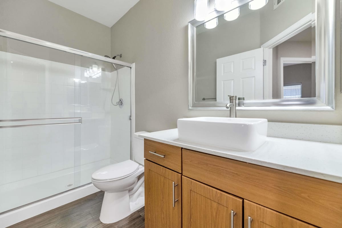 Apartment bathroom — representative home at Townhomes at Biltmore.