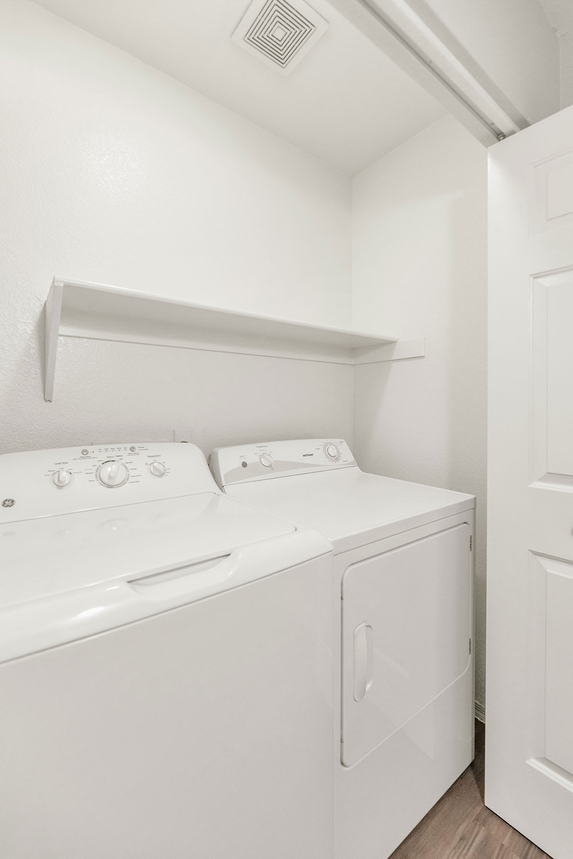 In-home laundry area — representative home at Townhomes at Biltmore.