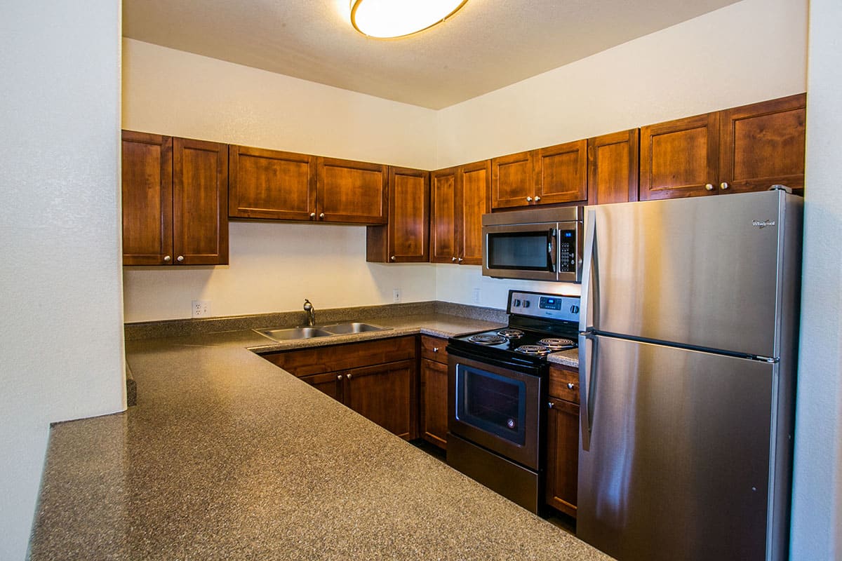 Apartment kitchen — representative home at RidgeGate Apartments.