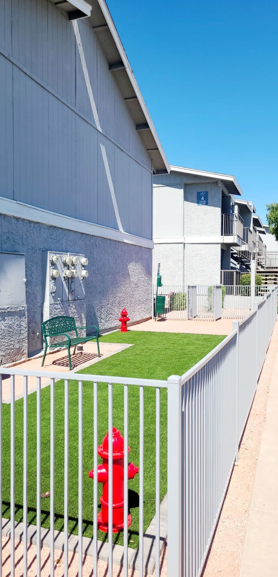 Enclosed dog exercise area at North Mountain Apartments.