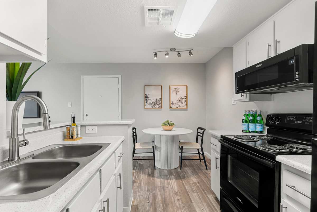 Kitchen and dining area at West 35th Apartments.