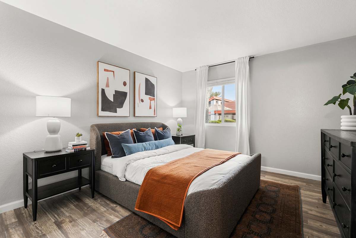 Furnished bedroom at West 35th Apartments.