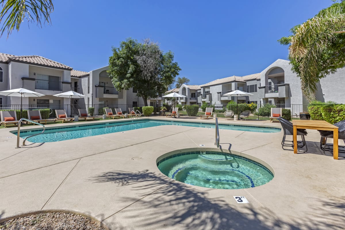 Pool and poolside area at Boulders at Lookout Mountain Apartment Homes.