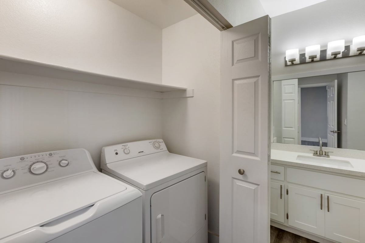 In-home laundry area — representative home at Boulders at Lookout Mountain Apartment Homes.