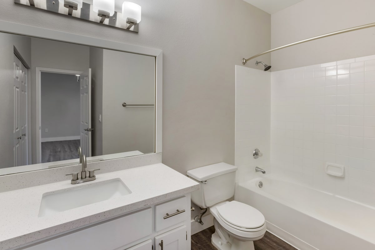 Apartment bathroom — representative home at Boulders at Lookout Mountain Apartment Homes.