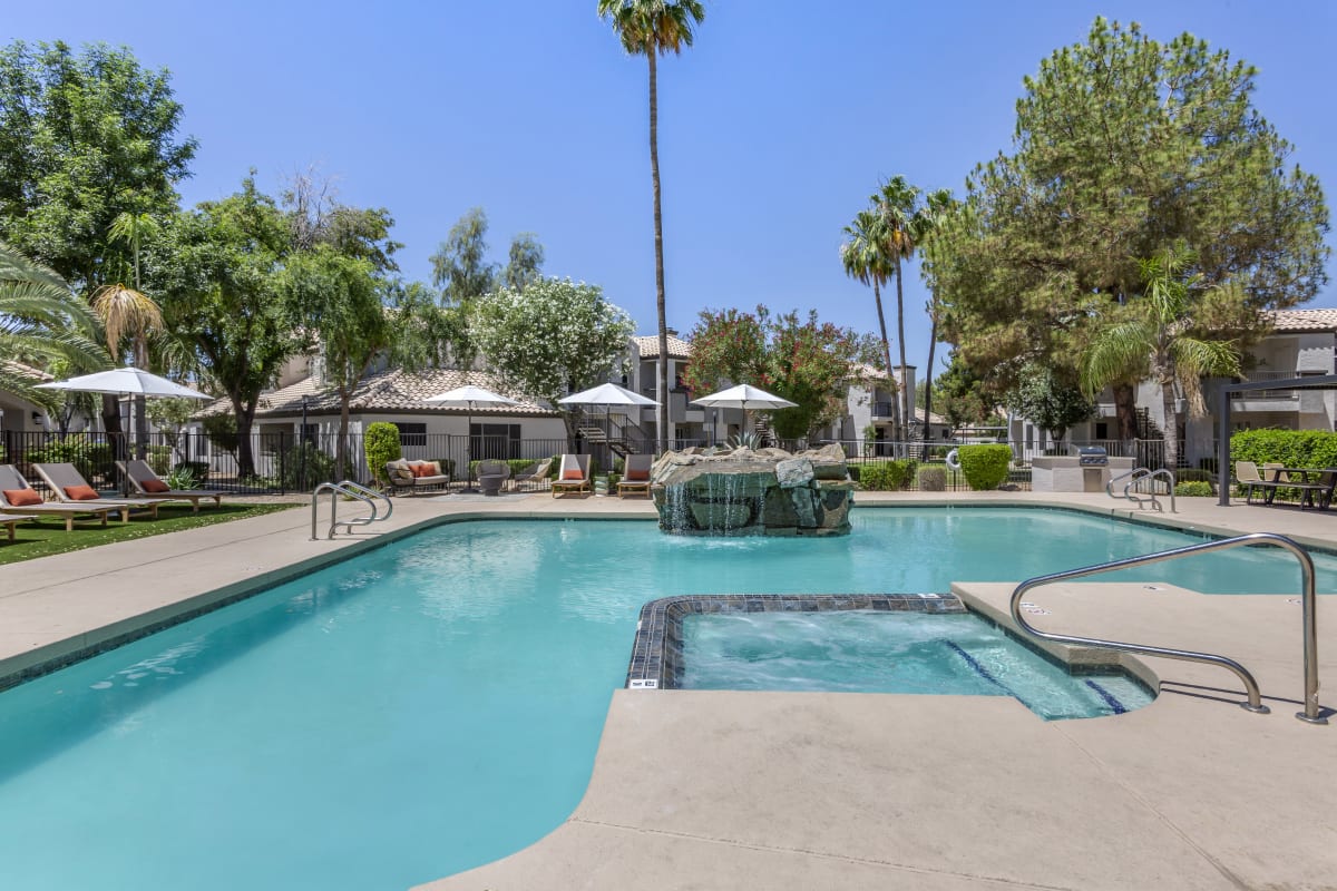 Pool and poolside area at Boulders at Lookout Mountain Apartment Homes.