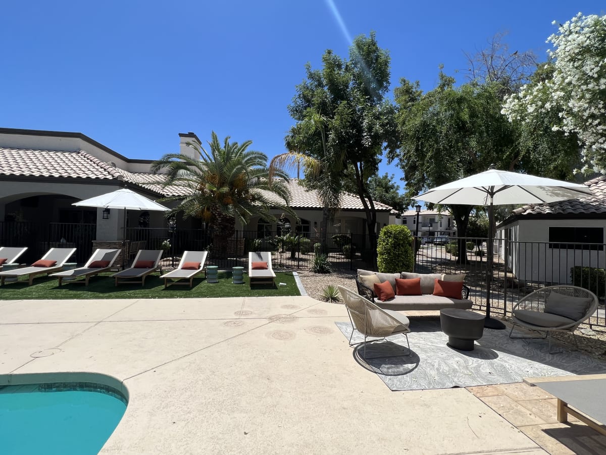 Pool and poolside area at Boulders at Lookout Mountain Apartment Homes.