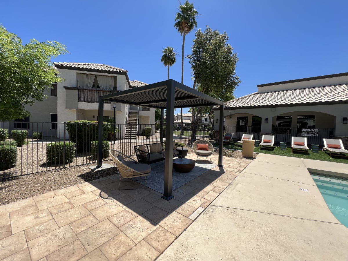 Pool and poolside area at Boulders at Lookout Mountain Apartment Homes.