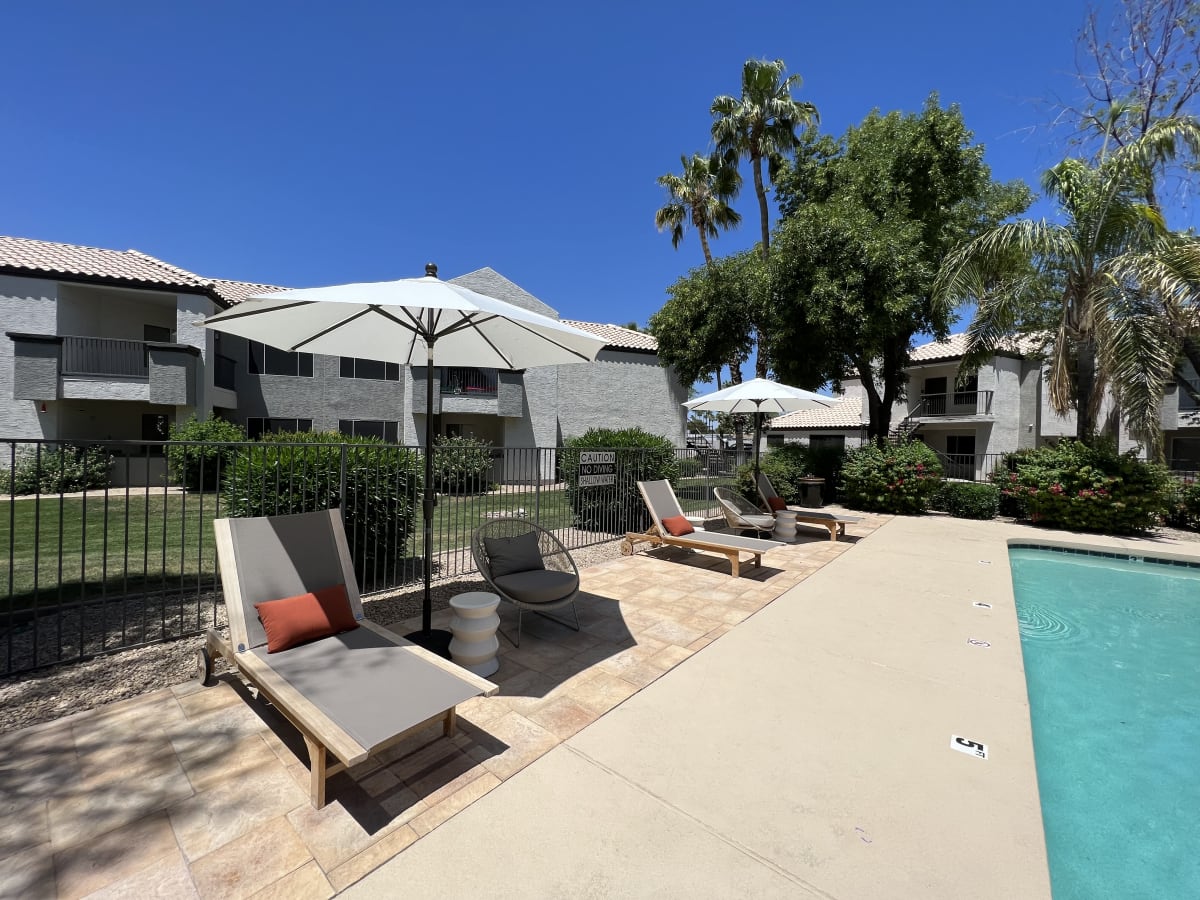 Pool and poolside area at Boulders at Lookout Mountain Apartment Homes.
