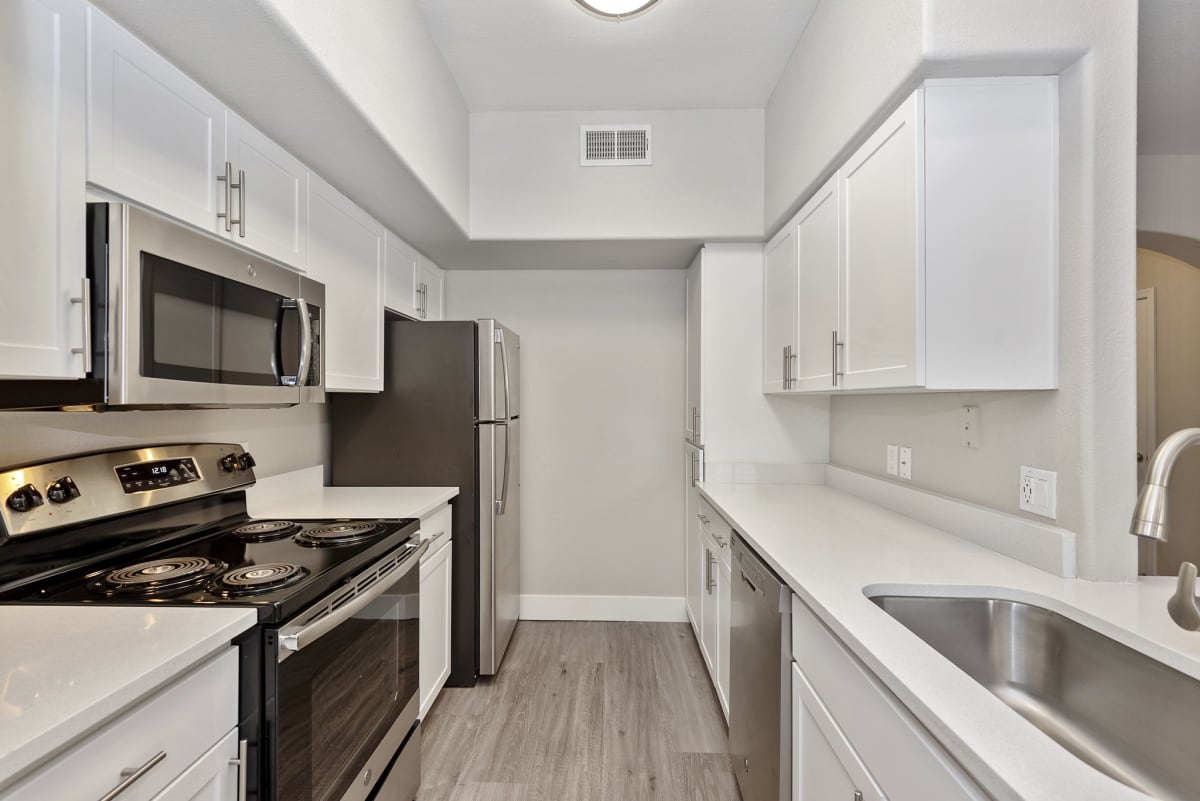 Apartment kitchen — representative home at The Retreat Apartments.