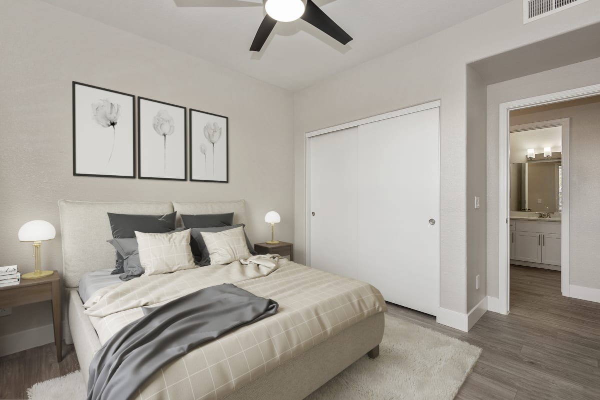 Furnished bedroom shown — representative home at The Retreat Apartments.