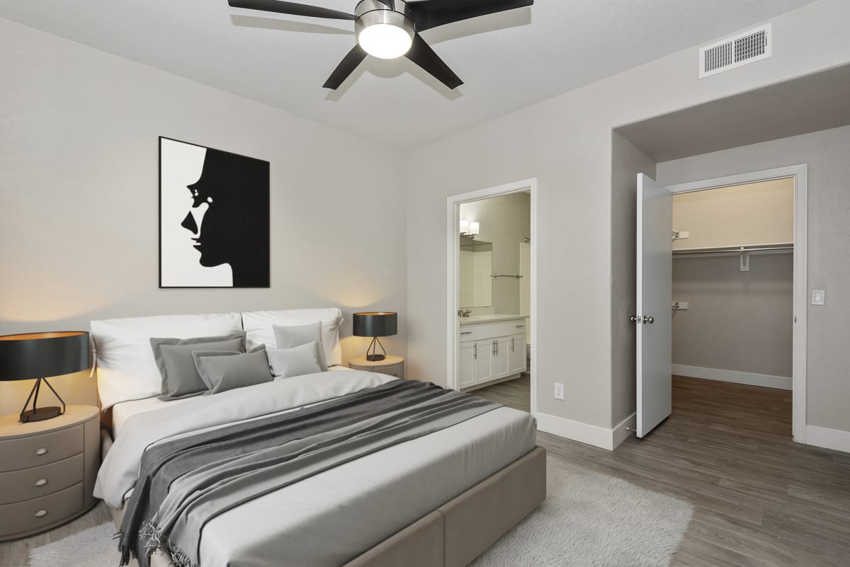 Furnished bedroom shown — representative home at The Retreat Apartments.