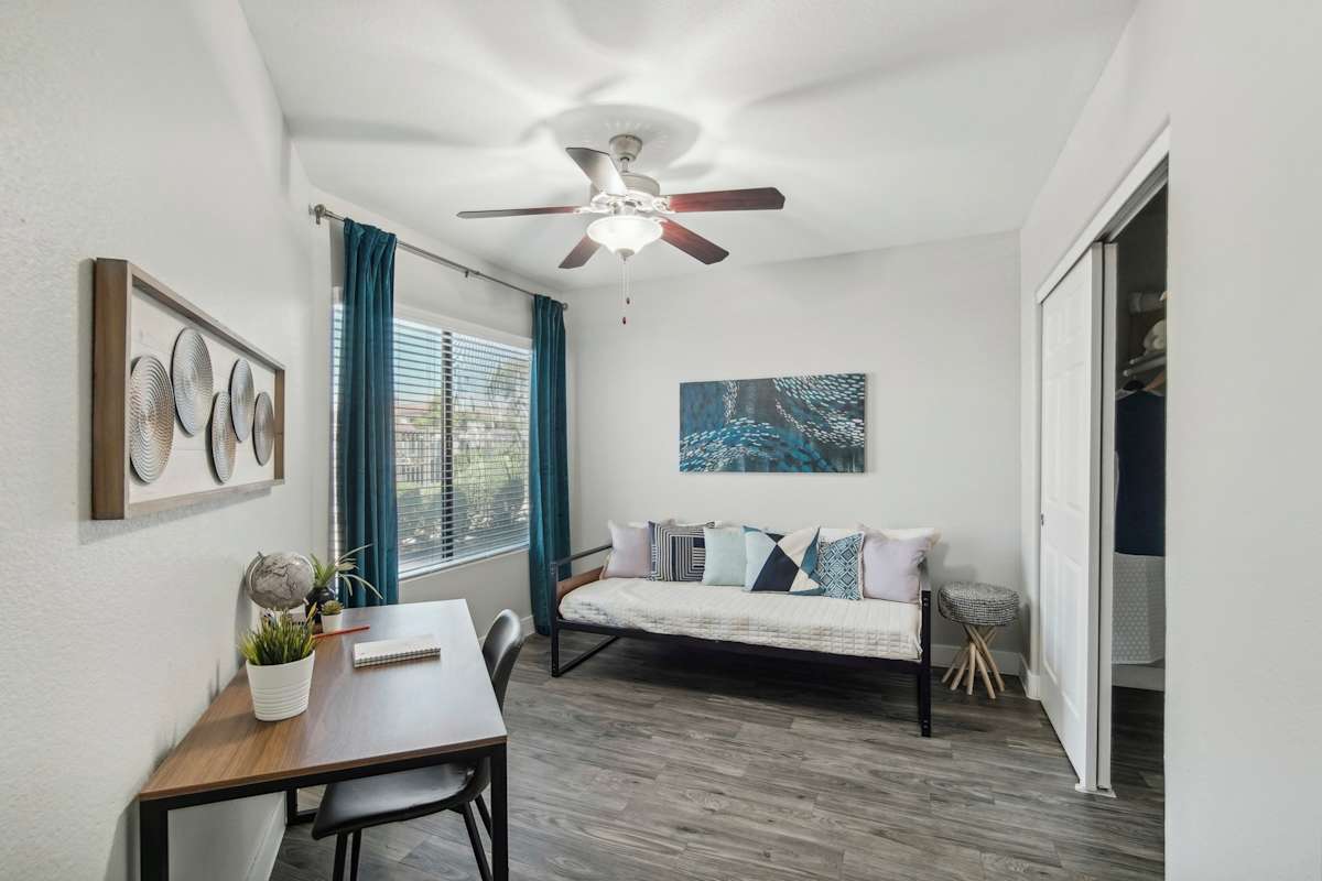 Work or study area shown — representative home at Sonoran Apartment Homes.