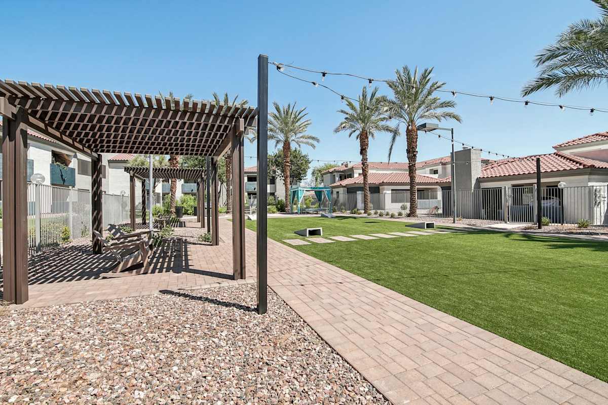 Cornhole game at Sonoran Apartment Homes.