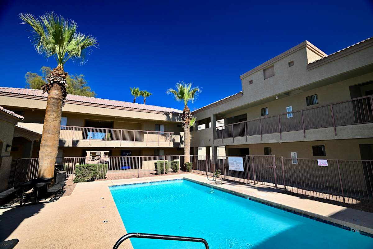 Pool and poolside area at Paradise Palms I.