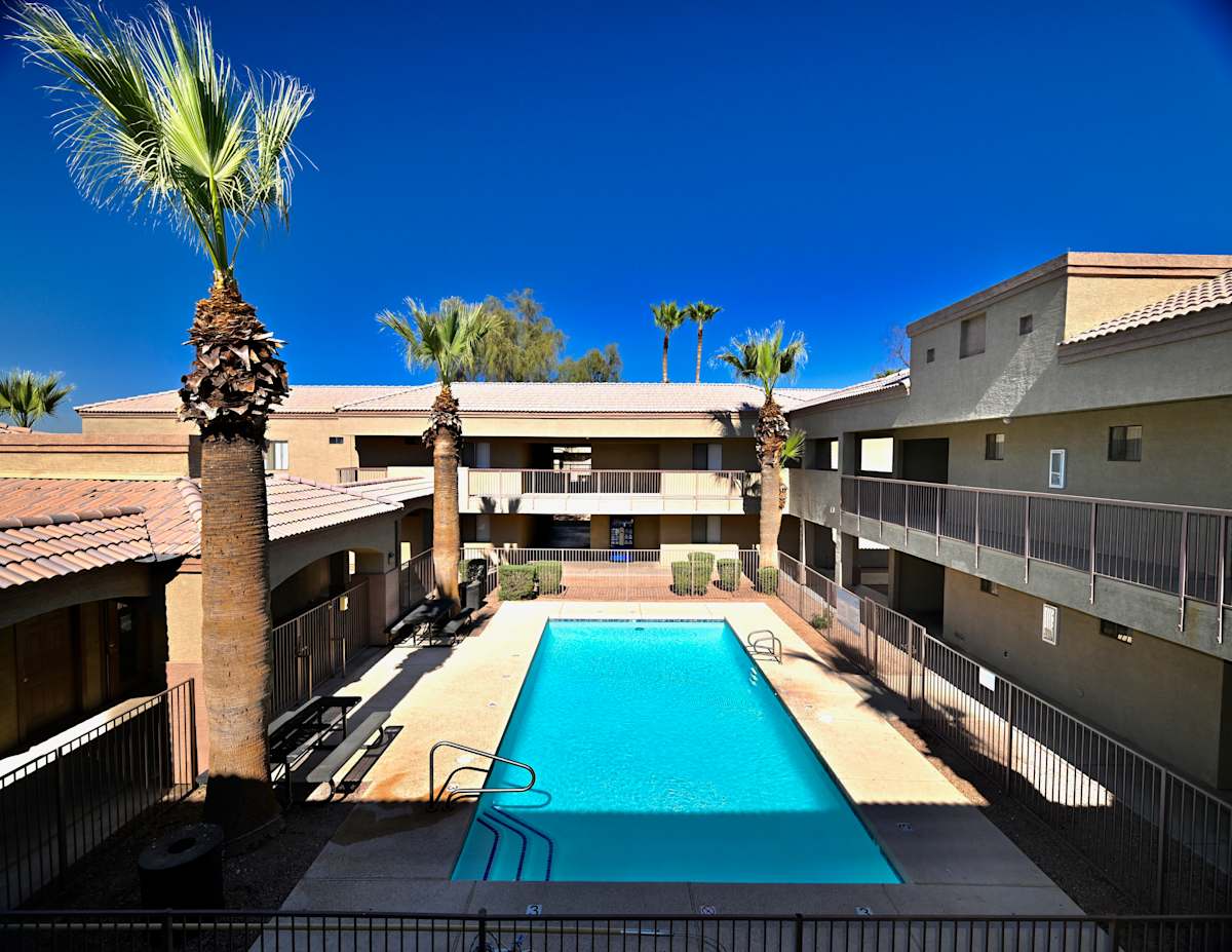Pool and poolside area at Paradise Palms I.