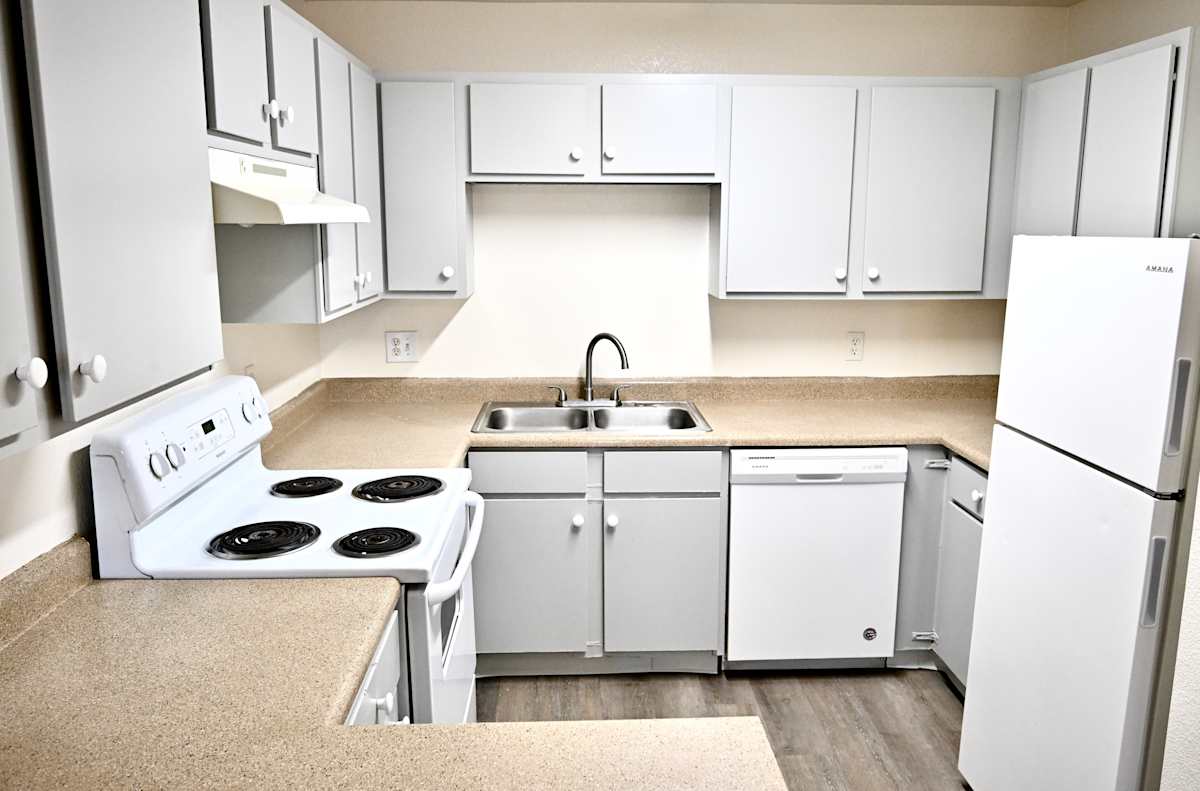 Apartment kitchen — representative home at Paradise Palms II.