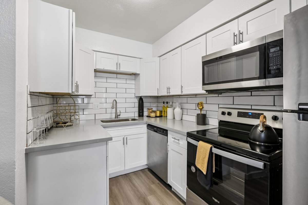 Apartment kitchen — representative home at Ember at North Phoenix.