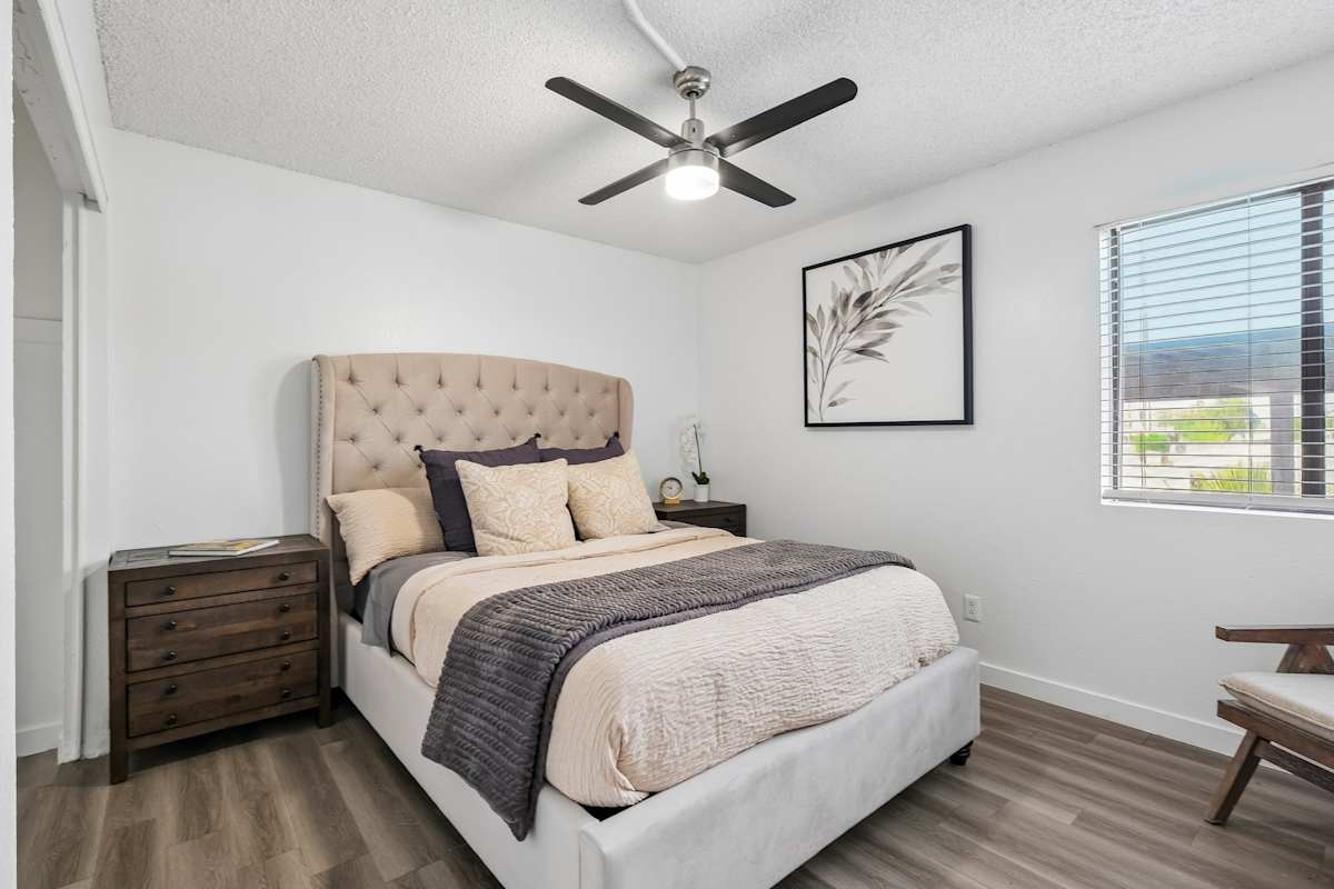 Furnished bedroom shown — representative home at Ember at North Phoenix.