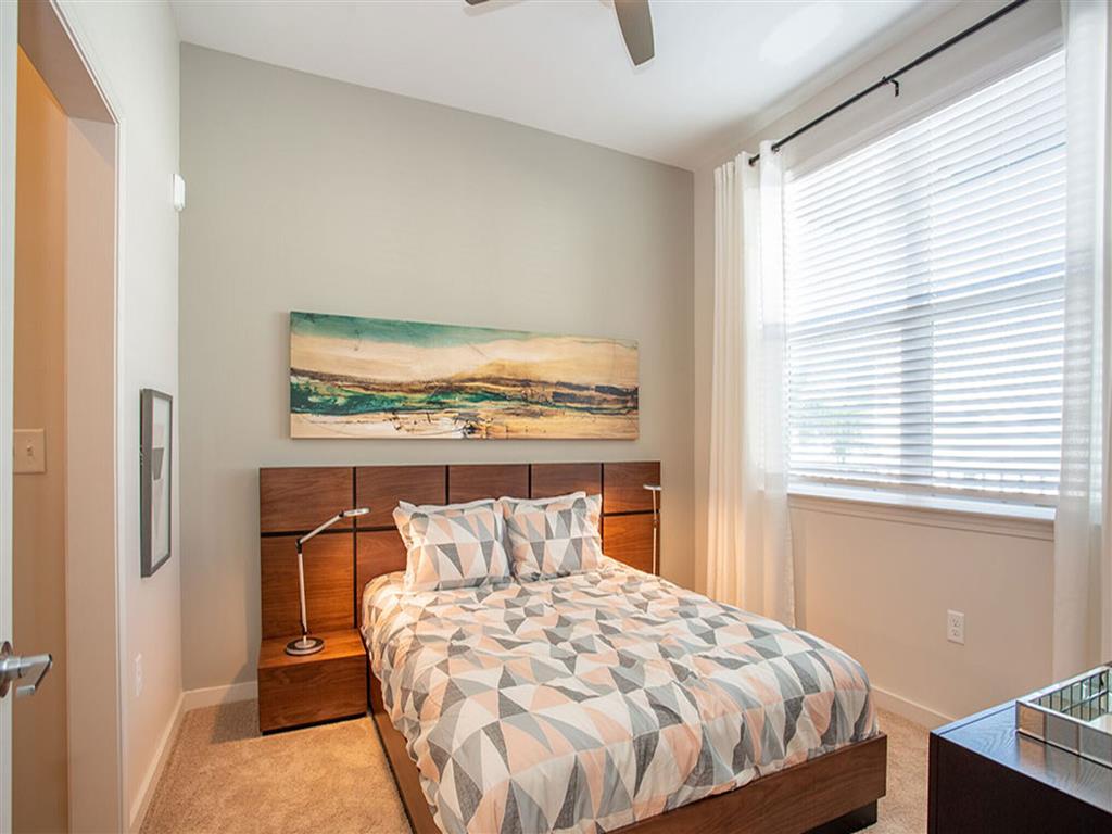 Bedroom with large window at 10X Tarpon Springs