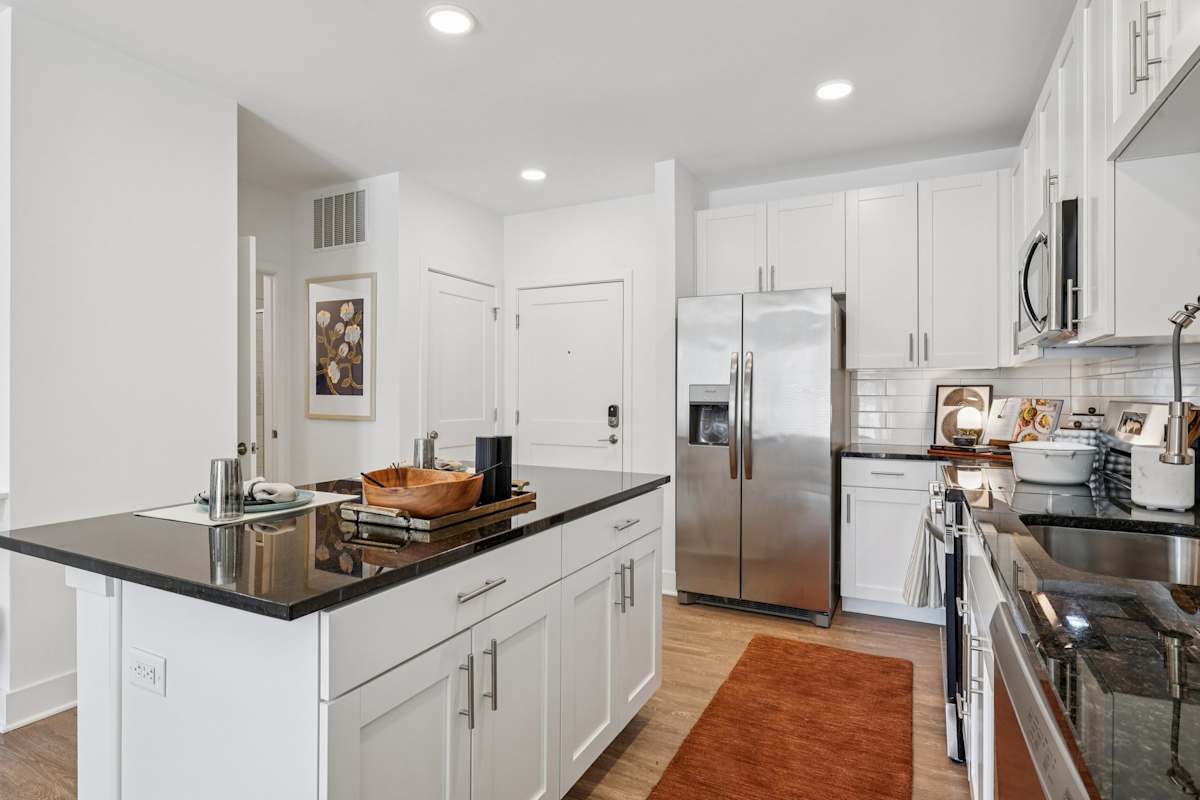 Contrast OTR bedroom with plank flooring - Cincinnati, OH