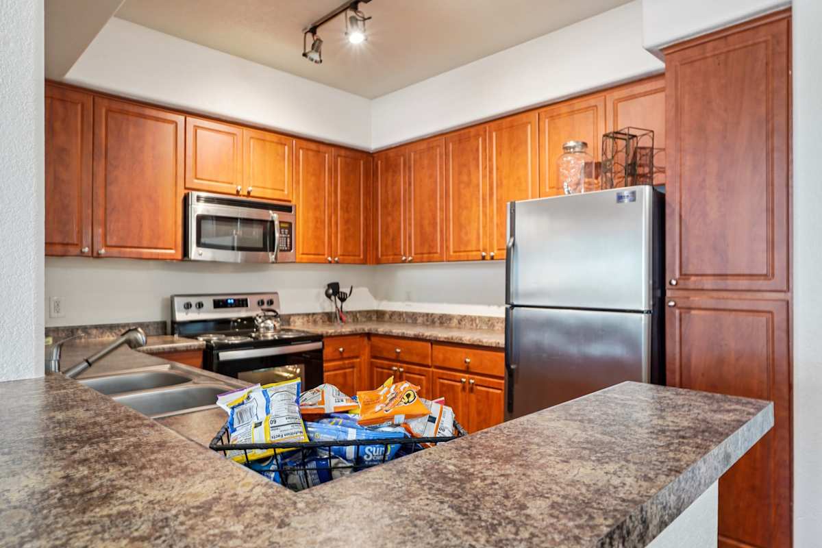 Apartment kitchen — representative home at Del Mar Apartments.