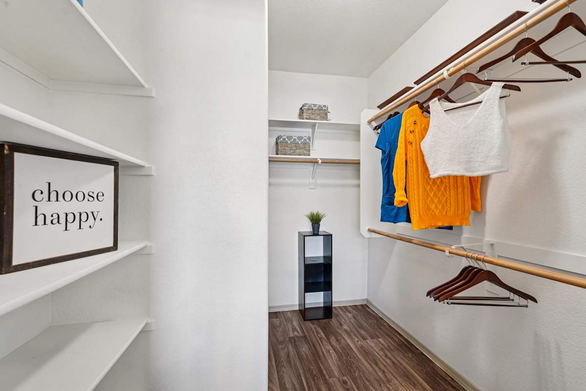 Closet storage — representative home at Del Mar Apartments.
