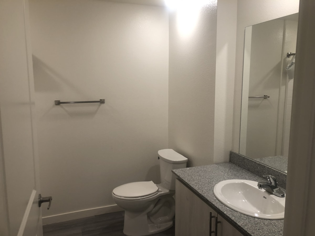 Apartment bathroom — representative home at VB on 12th.