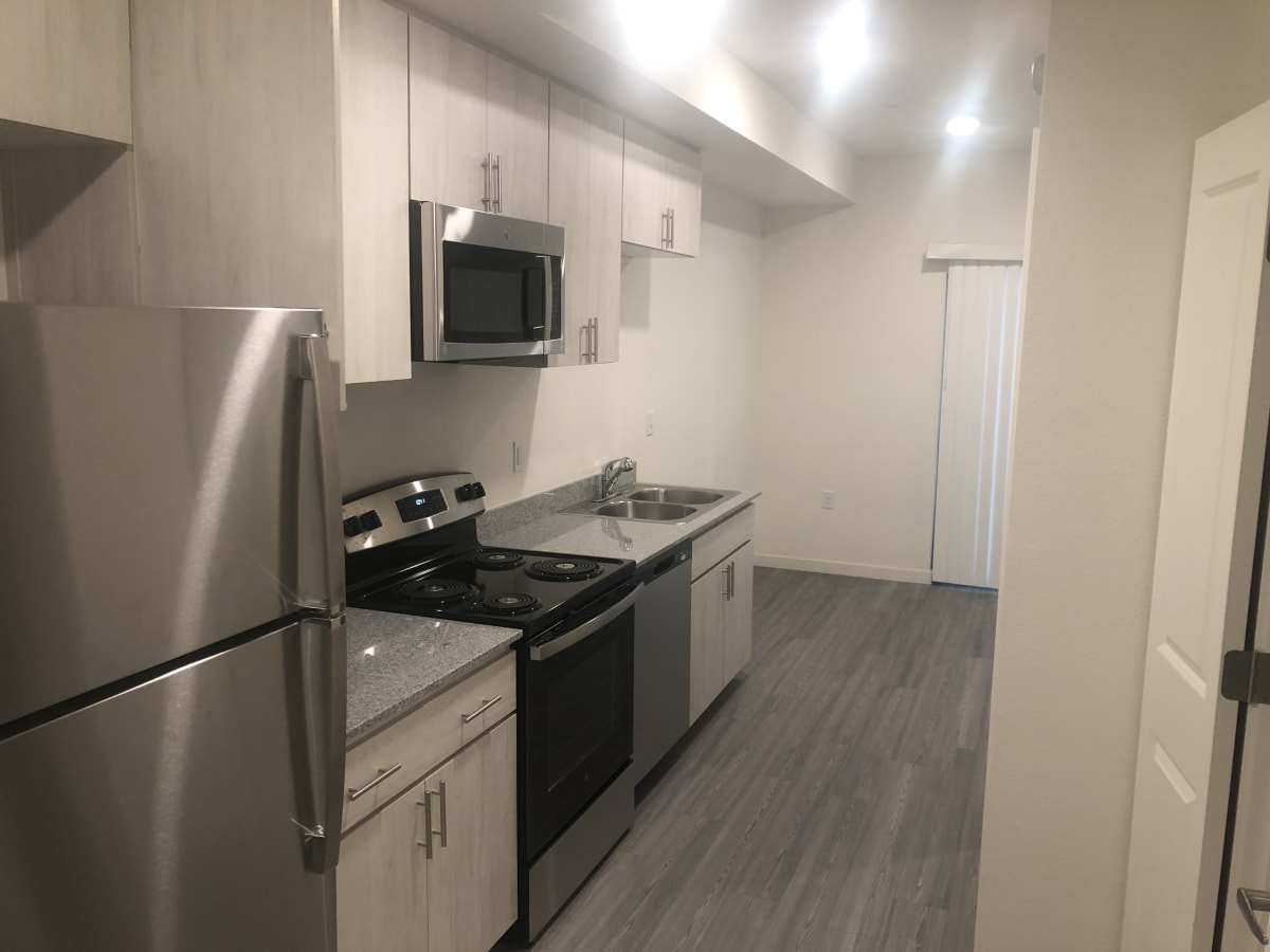 Apartment kitchen — representative home at VB on 12th.