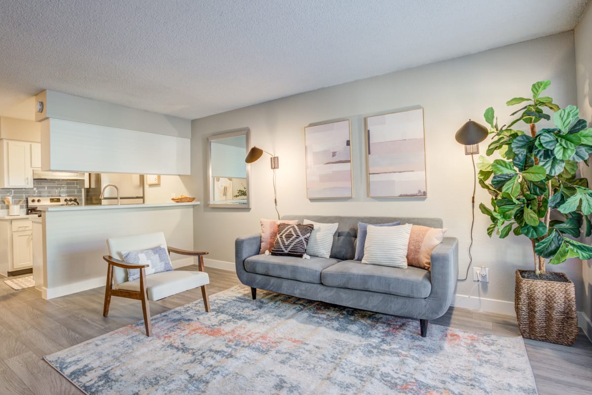 Furnished living room with adjoining dining space — view 1 at Ardella on 67th.