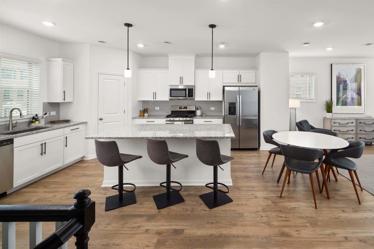 Waverly Village kitchen and entry hallway with granite counters - Lawrenceville, GA