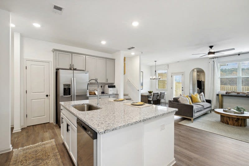 The Bend at Pettit Creek kitchen with island and stainless appliances - Cartersville, GA