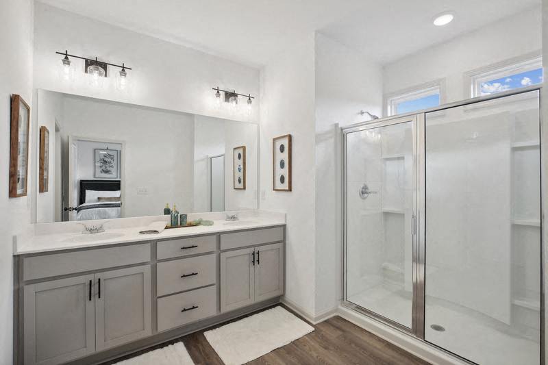 The Bend at Pettit Creek primary bathroom with double vanity - Cartersville, GA