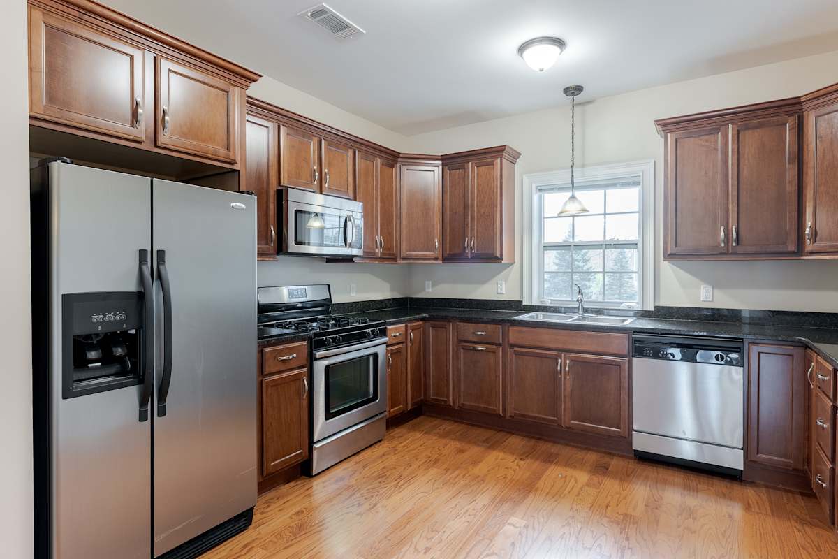 Vineyard Commons kitchen with stainless steel appliances - Highland, NY