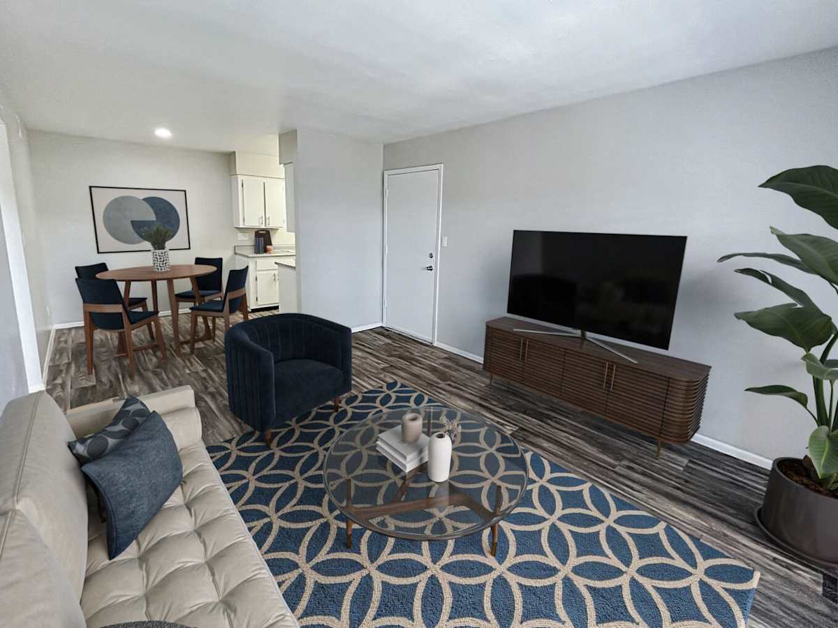 Staged example: furnished apartment living area shown at The Valencia.