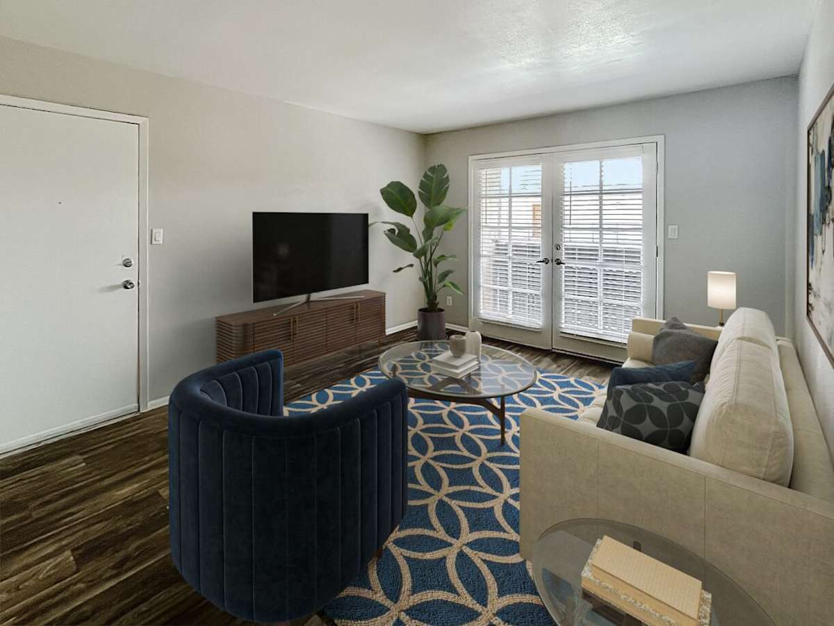 Staged example: furnished apartment living area shown at The Valencia.