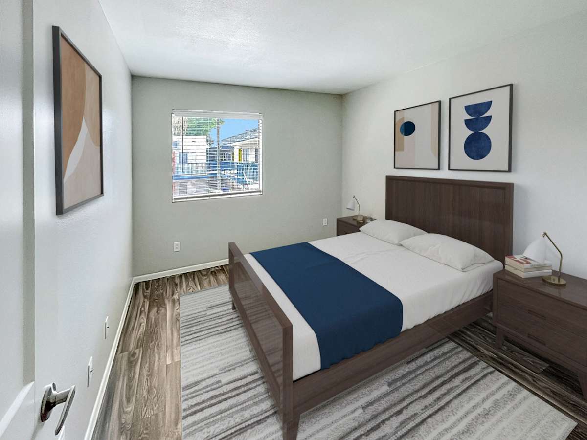 Staged example: furnished bedroom shown at The Valencia.