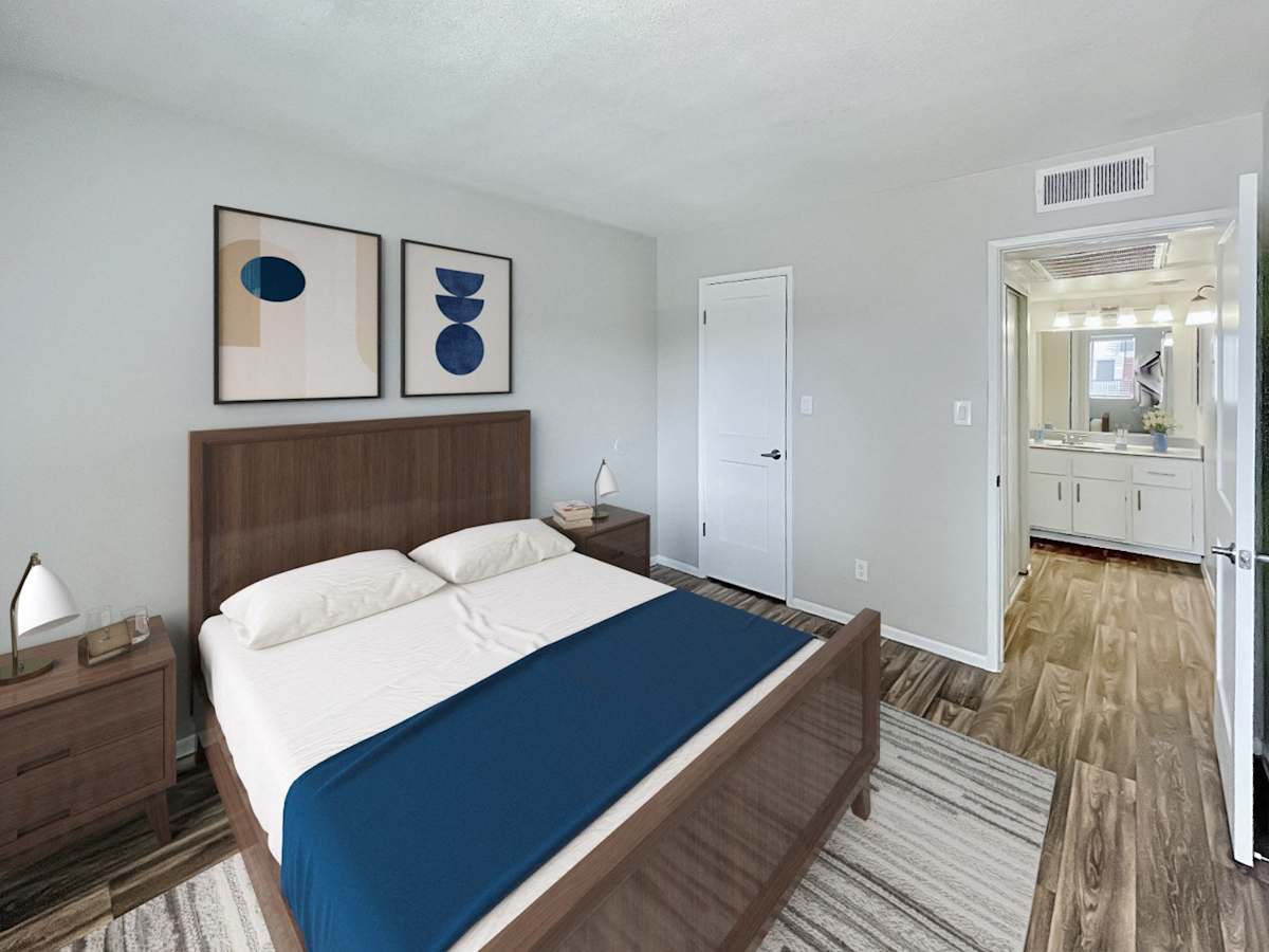 Staged example: furnished bedroom shown at The Valencia.
