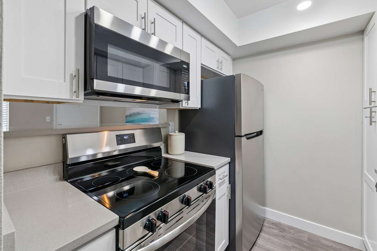 Apartment kitchen — representative home at Raystone.