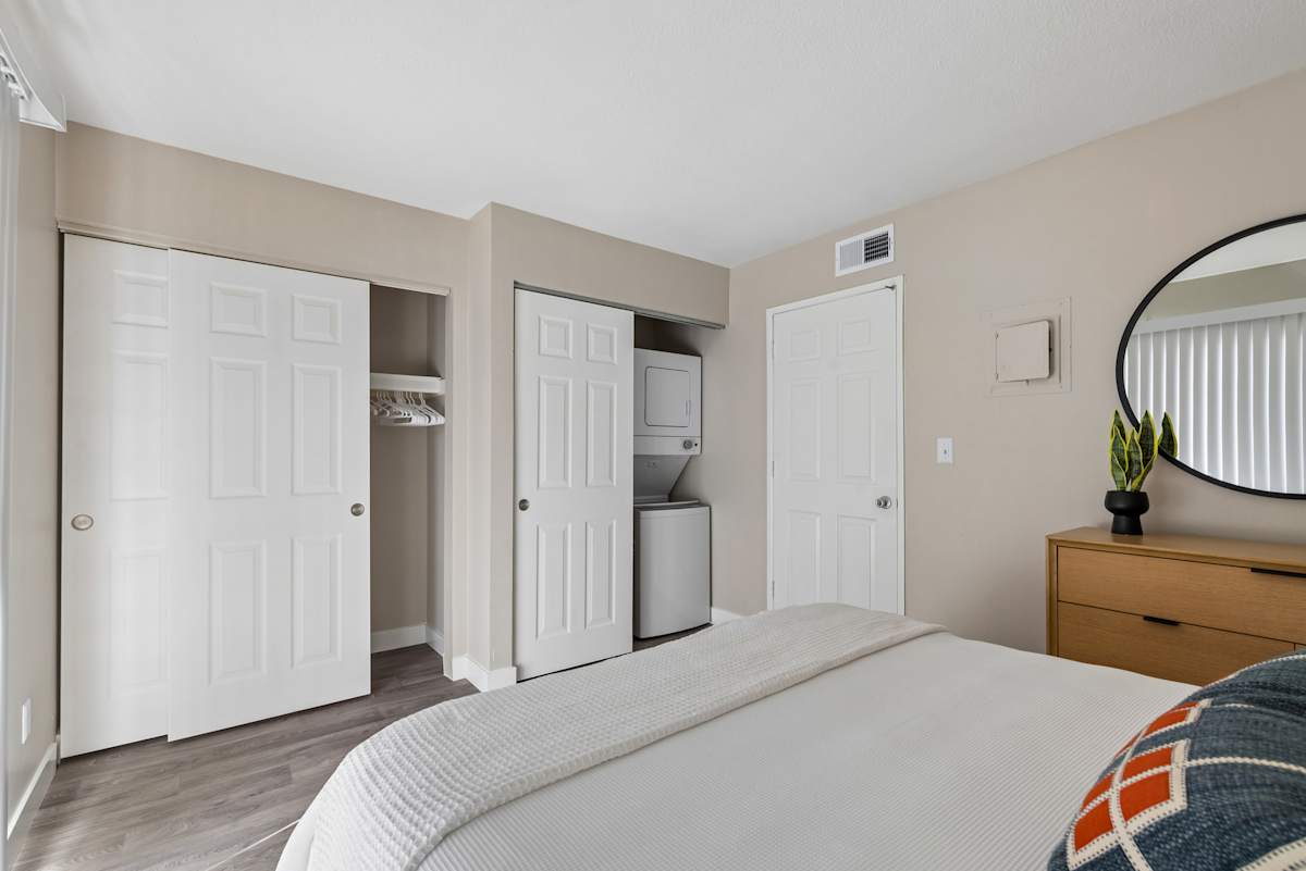 Furnished bedroom shown — representative home at Raystone.