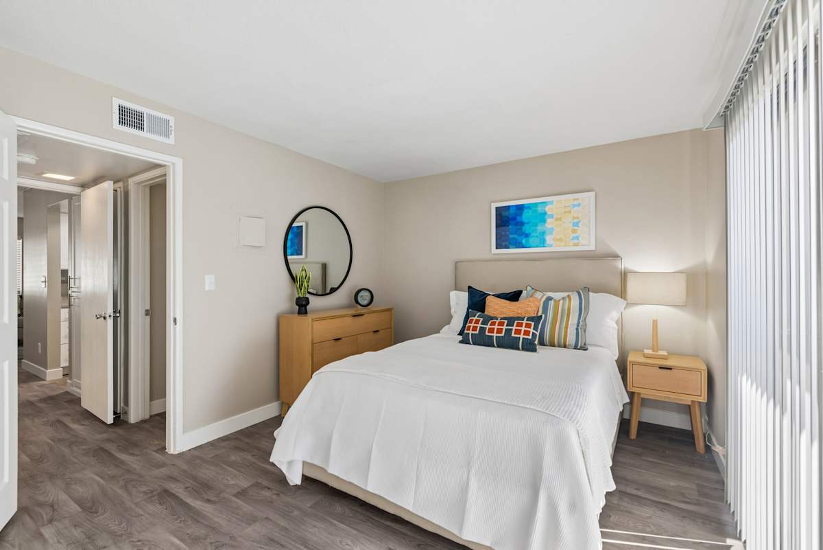 Furnished bedroom shown — representative home at Raystone.